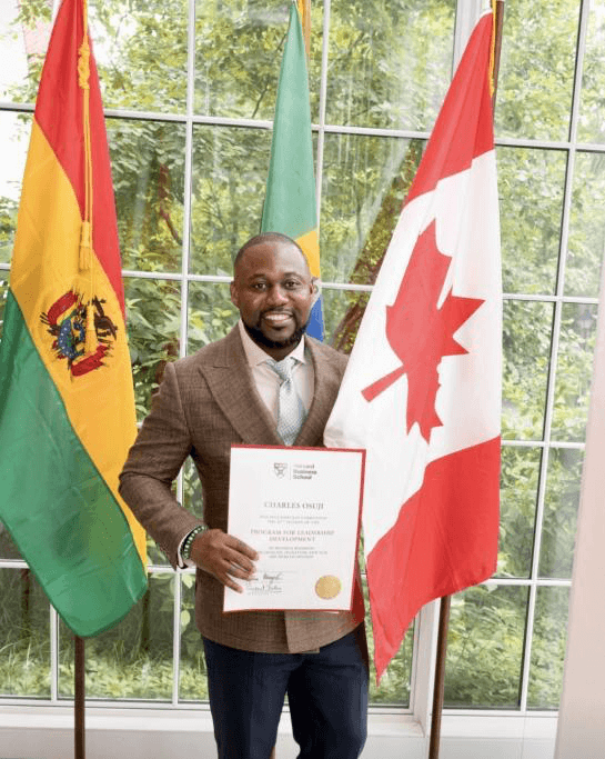 Dr. Charles Osuji with Harvard Business School certificate