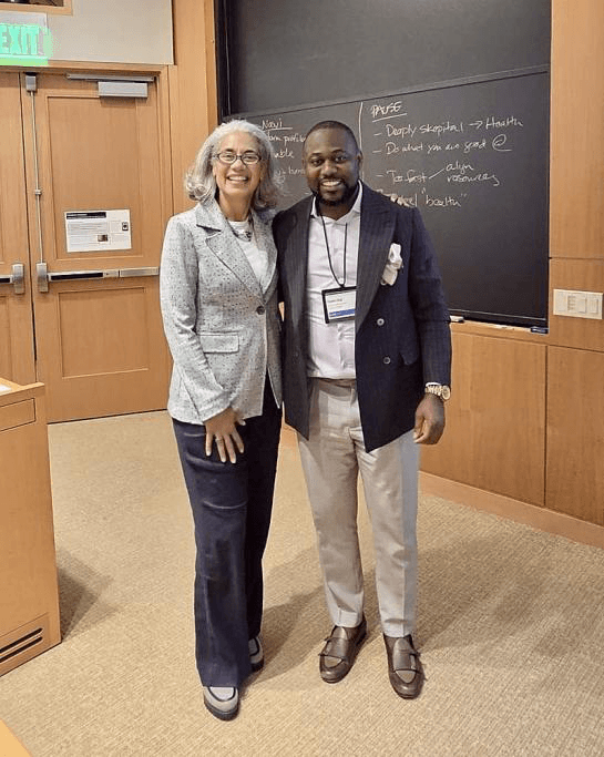 Dr. Charles Osuji with Harvard Business School faculty member